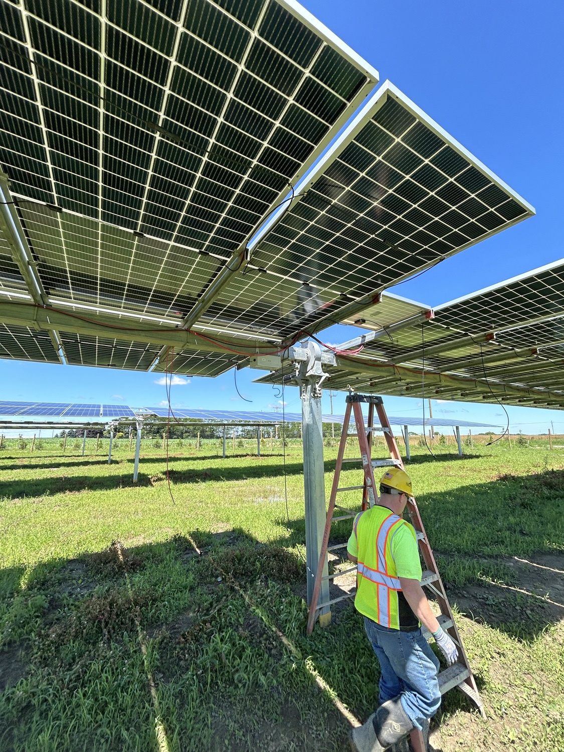 Mills’ Technician working on Community Solar Project